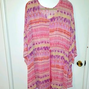 Sheer summer cover up or long top.